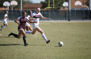 Sarah Stewart, chemistry sophomore, tries to recover the ball from an opponent during the MSU vs West Texas A&M game at Stang Park, where MSU lost 3-1, Sunday, Oct. 29, 2017. Photo by Francisco Martinez