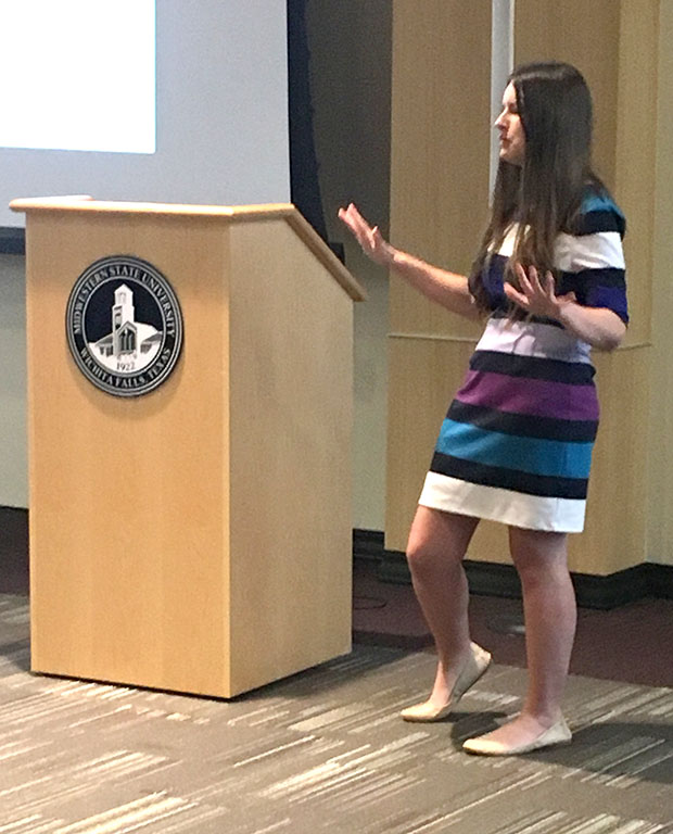 Lauren Nichols, mental health graduate student, speaks to attendees at the counseling center work shop Four Steps to a 4.0 in the Legacy Hall Multipurpose room on Oct. 3. Photo by Latoya Fondren