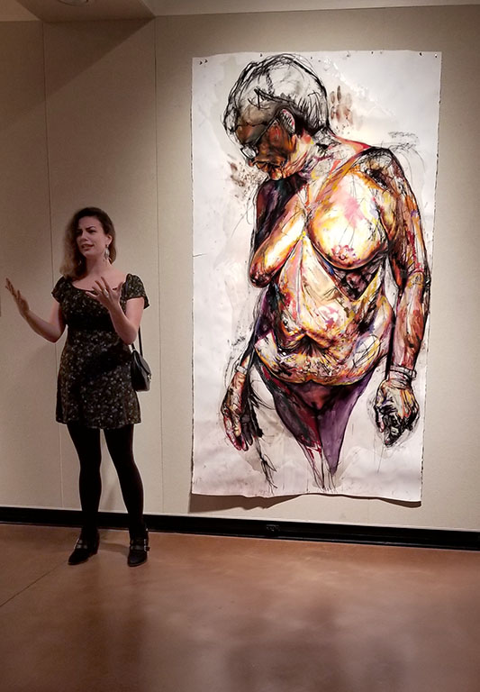 Ghislaine Fremaux, assistant professor of art at Texas Tech University, discusses the reasoning behind her art at the Juanita Harvey Art Gallery on Sept. 29.