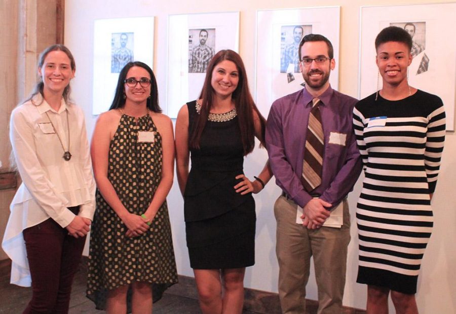 Teresa Lopez, 2015 graduate, Logan Canafax, 2017 graduate, Jessica Cartwright, executive director of National Alliance of Mental Illness, Kenneth Shanks and Jamie Gardner, 2017 graduates, at the Gray Matters exhibit on Oct. 7. Photo by Jeri Moore