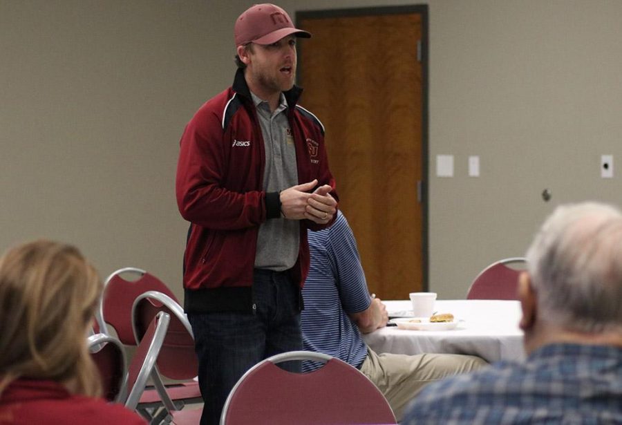 Koby Styles, cross country and track coach, gives an update of the Track Season and where he thinks the team will continue to grow into, during the Lunch with Mustangs held at Wichita Falls Museum of Art, Tuesday, Jan. 30, 2018. Photo by Rachel Johnson