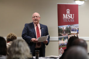 To inform faculty and staff on the financial standings from donors, Tony Vidmar, vice president of university advancement and public affairs, encourages attendees to take ownership of the university through sponsorships at the Town Hall meeting Tuesday, Feb. 13, 2018. "Even if you don't want to be the one to fundraise, you might know someone who is in just the right place to donate," Vidmar said. Photo by Cortney Wood