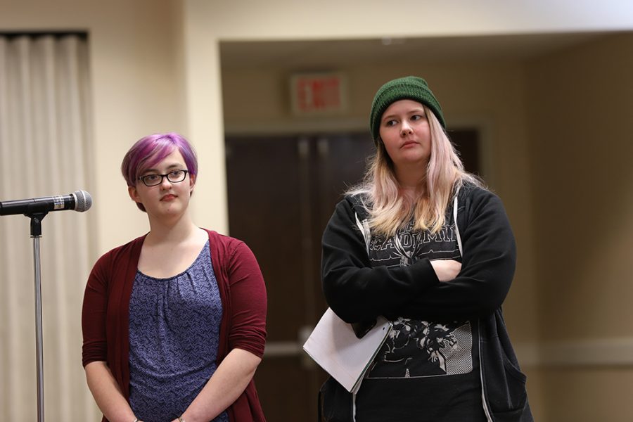 Catherine Stepniak, phsychology and sociology senior, and Morgan Sinclair, sociology junior, ask questions at the Open Forum about campus safety in CSC Comanche on March 19. Photo by Justin Marquart