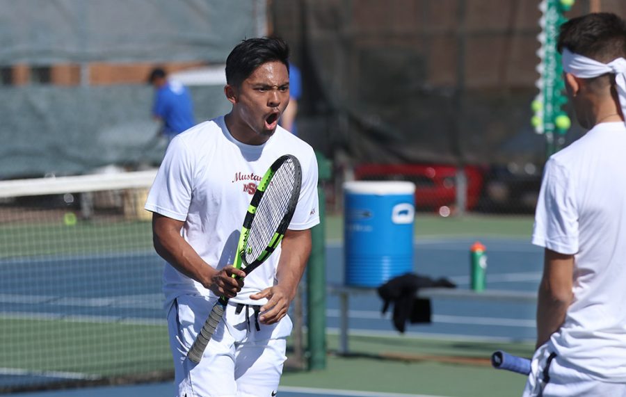 Dillon Pineda, biology junior, yells in exitement after winning his doubles match during the Collin College vs. MSU tennis meet at MSU on Friday, Feb. 9, 2018. File photo by Francisco Martinez