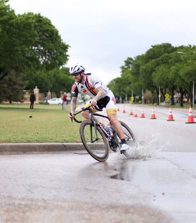 Jason Perkins, mechanical engineering junior, rounds the corner of Taft Blvd and Nocona Trail during one of the first couple of laps Mens A race at the 2018 Vuelta del Viento at Midwestern State University, Saturday April 21, 2018.