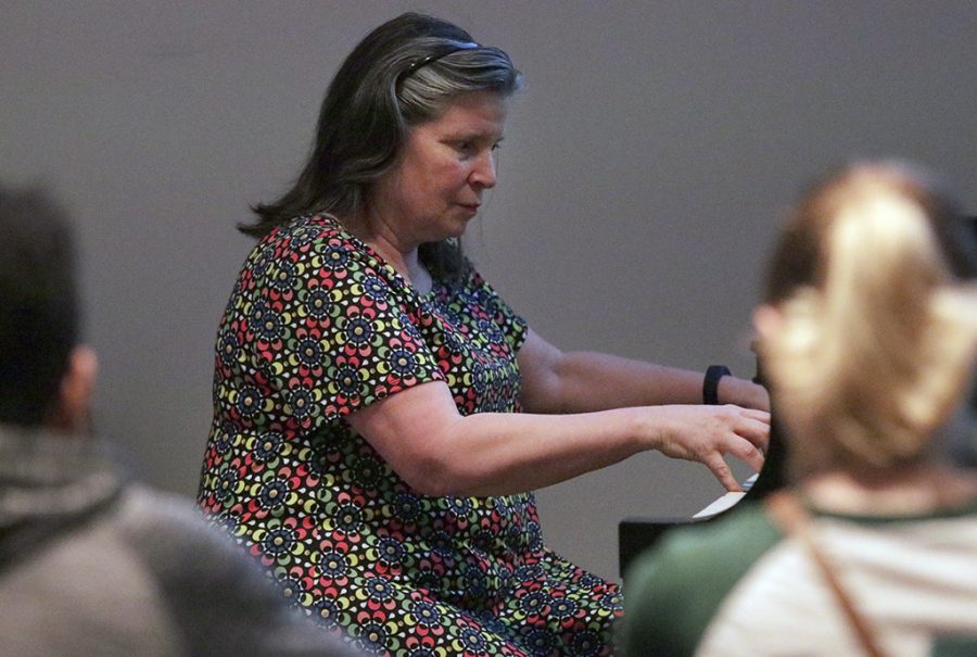Ruth Morrow, music professor and Bolin distinguished chair of piano, teaches her Tuesday/Thursday 8 a.m.  Introduction to Western and Worl Music, in Fain Fine Arts Center Room C111. Photo by Rachel Johnson