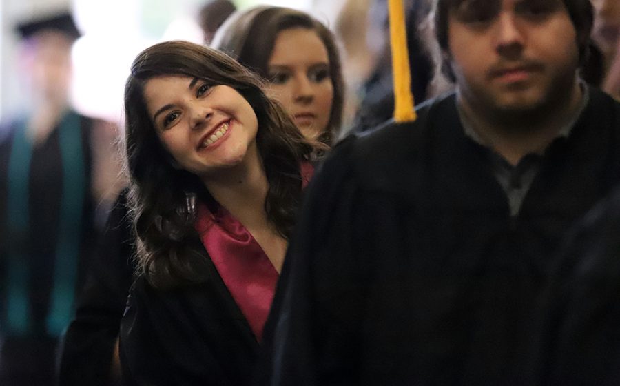 Selena Mize, art graduate, waits in line to get her name card at the spring 2018 graduation at Kay Yeager Coliseum on May 12, 2018. Photo by Justin Marquart