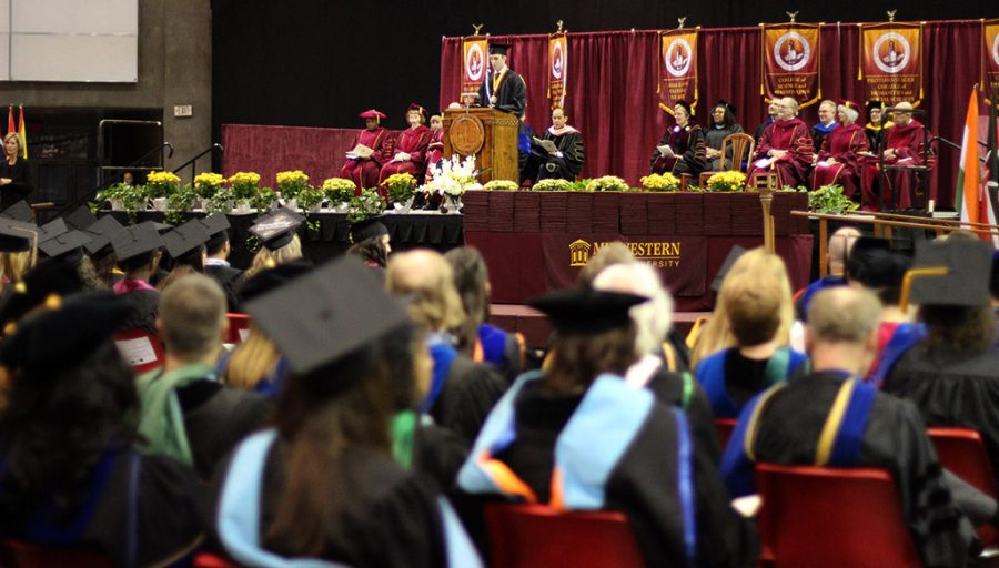 Luke Allen, humanities and social sciences, gives the Commencement Address at Kay Yeager Coliseum, May 12, 2018. Photo by Rachel Johnson