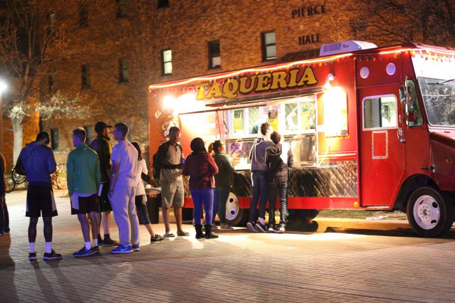 Students wait in line to grab food from the El Norteno food truck, they had a $1 taco sale during Club Piecre, held on Mustangs Walk, March 17, 2016. Photo by Makayla Burnham 