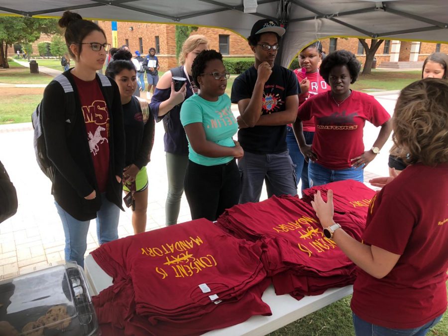 Student wait outside Clark Student Center to get their Consent is Mandatory shirt, prompting a discussion of what consent means on Consent Day Sept. 6, 2018. Photo by Bradley Wilson