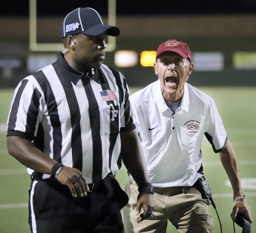 After a call against MSUs offense, head coach Bill Maskill disagrees with the sideline referee in game against Tarleton State University, Oct 27. Photo by Bridget Reilly