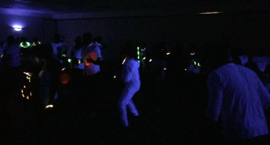 To close out the 2018 Caribfest, dozens of students attend the Glow Fete in the Comanachee Suits in the Clark Student Center on Saturday, Oct. 6, 2018. Photo by Rebecca Writing