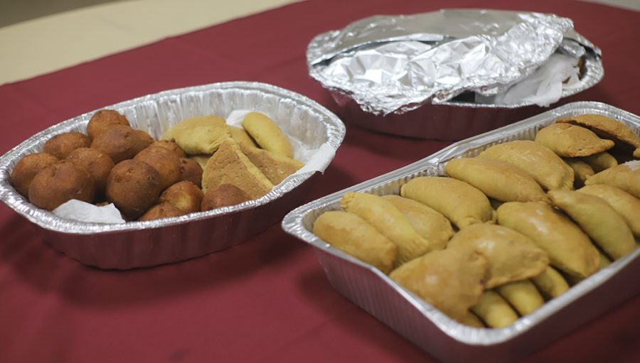 Pictured here are puff puff and meat pies. Puff puff is a fried doughnut, popular throughout Africa by different names.