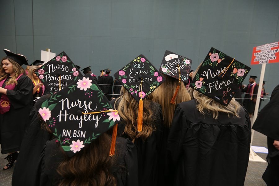 Hats from students in nursing at Midwestern State University graduation Dec. 15, 2018. Photo by Bradley Wilson