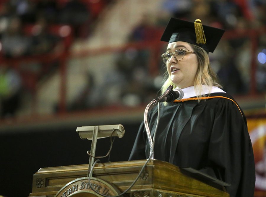 Valarie McCubbins says, Dont bury the lead while talking as the commencement speaker at Midwestern State University graduation Dec. 15, 2018. There are no rules, she said. There are all those unspoken rules we all think exist, but they dont. Life isnt scripted. I threw out the script I had for my life. Photo by Bradley Wilson