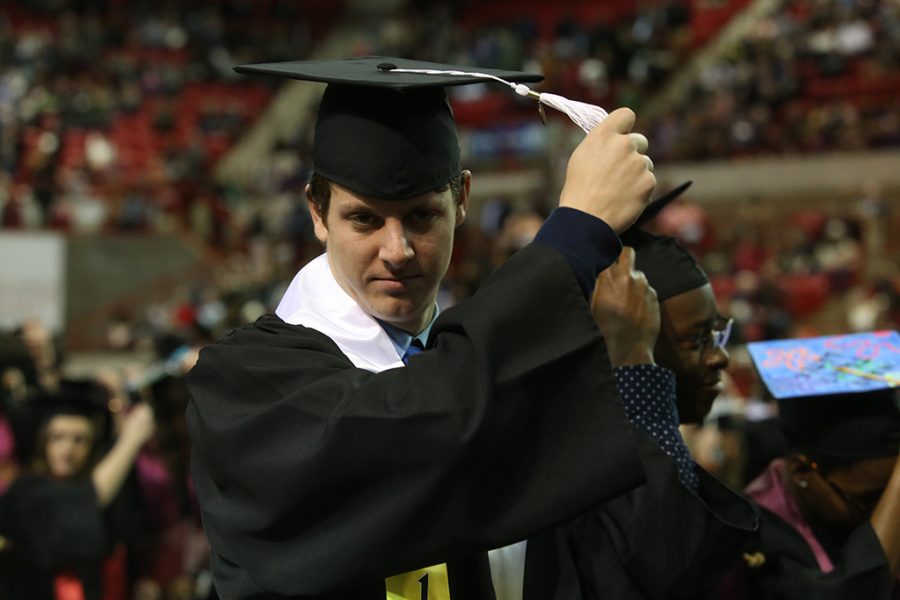 Adam Sutton, education, moves his tassle at Midwestern State University graduation Dec. 15, 2018. Photo by Bradley Wilson