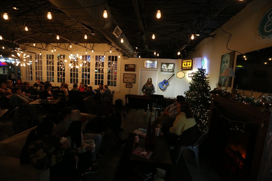 Micayla Kelsey, music freahman, performs at Frank And Joes Coffee House before finals. Photo by Nathan Martinez