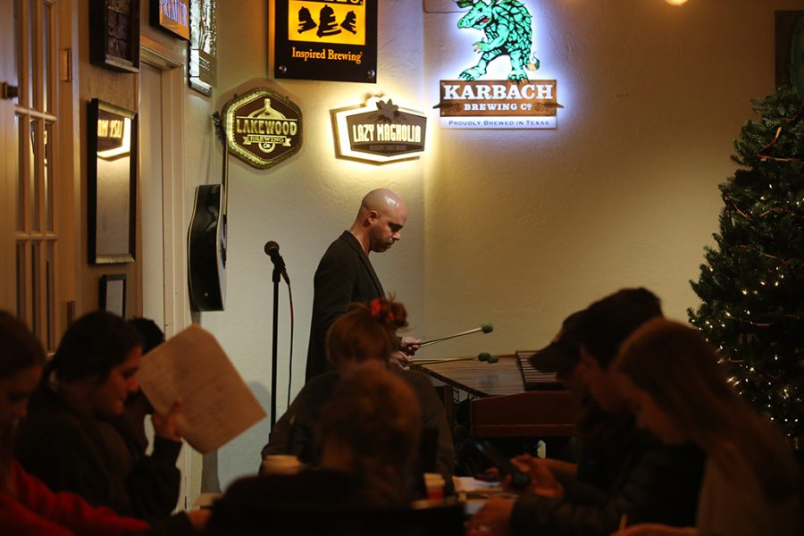 Mike Brenmark, music education senior, plays the marimba at Frank And Joes Coffee House. Photo by Nathan Martinez