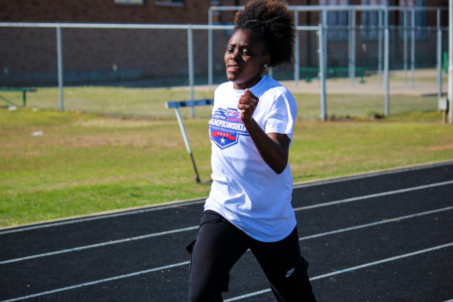 Sports and leisure studies sophmore, Taylor Carr, practices the 300m dash