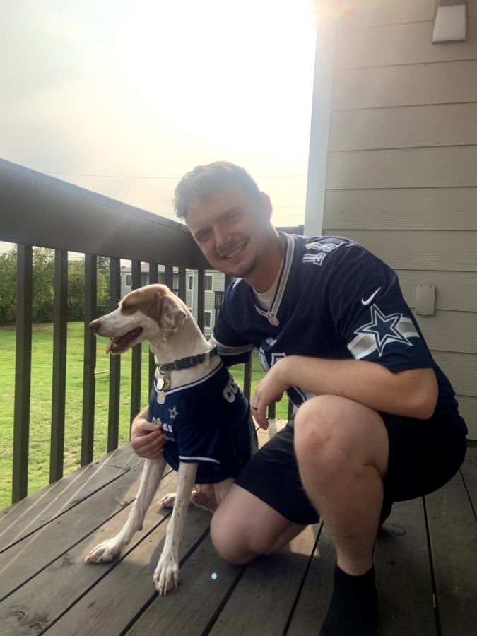 Amos Perkins and his dog Bruno cheering the Cowboys on to another loss. 