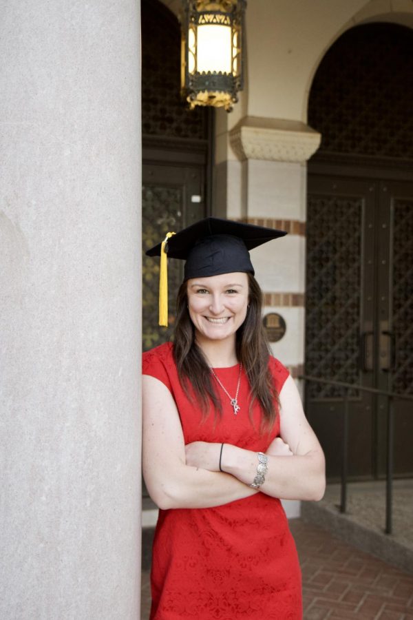 Bridget Reilly poses with her graduation cap, April 9