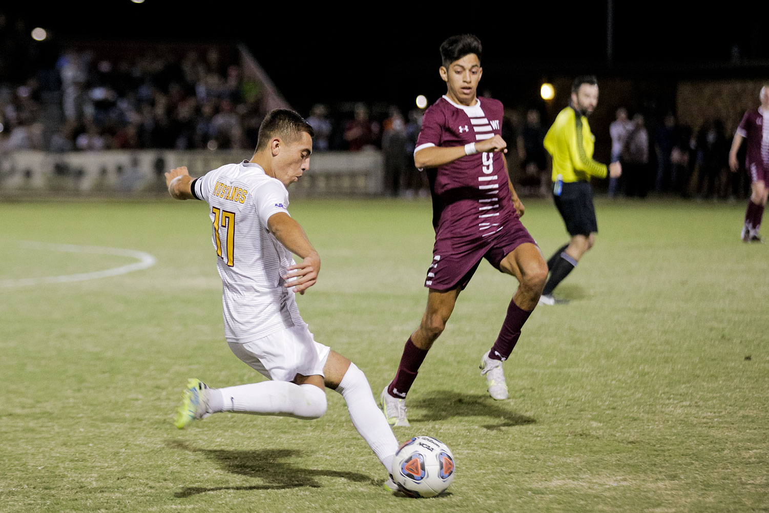 Kinesiology senior and midfielder Carlos Flores winds up for a kick to send the ball closer to West Texas A&M's goal in the second half