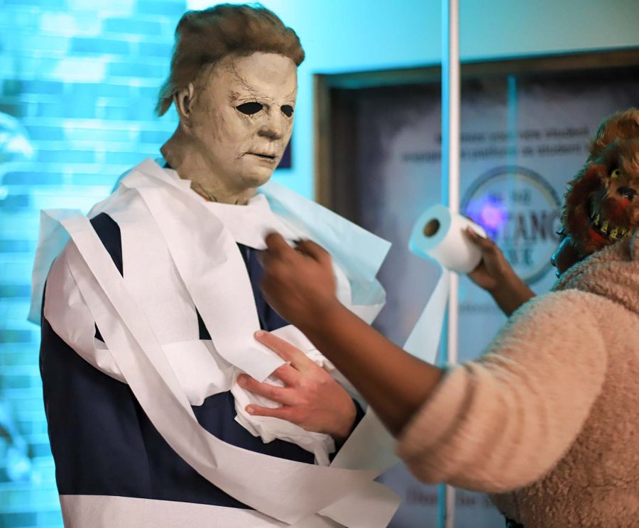 General business junior Daniel Gallivoda participates in the mummy wrapping contest as Micheal Myers.