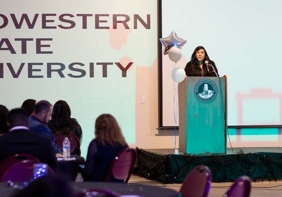 Guest speaker and MSU alumnus Valerie Martinez speaks to the audience at Noche de Estrellas. "You need people who are going to be there for you and assist you in the ups-and-downs. These ups-and-downs will not end with your collegiate years," Martinez said.