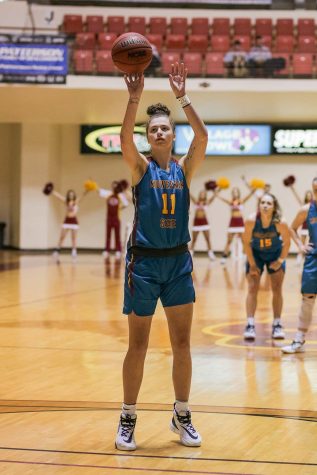 Masters of health services administration junior and forward Hannah Reynolds shoots after Arkansas-Fort Smith fouls.