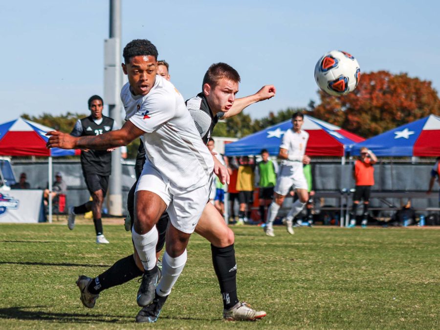 Mechanical engineering junior and defender Sebastian Kennedy turns around to chase the ball before a Lubbock Christian University player can reach it.