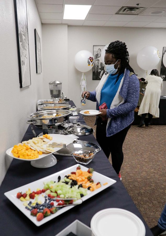 Guests grab food at the Core Values celebration, Feb. 18.