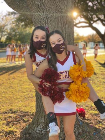 Accounting senior Kassidy Knight poses with nursing senior and fellow cheerleader Ashleigh Miller. Photo courtesy of Kassidy Knight.