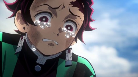 Tanjiro llorando por la muerte de Rengoku.