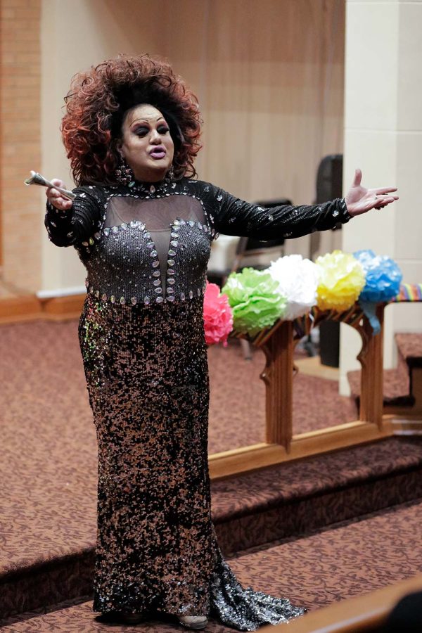 Veteran drag queen Tiffany Addams gestures to the audience during her performance, April 8.