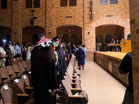 Black graduates line up at the front seating before the start of the black graduation ceremony, 2022.