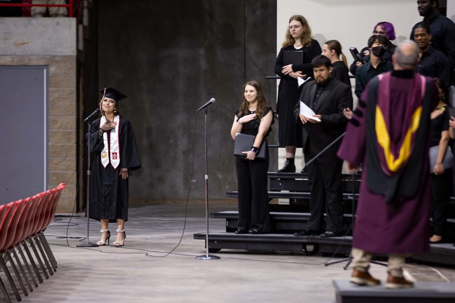 Bachelor of music graduate Haley Hancock performs The Star Spangled Banner before the start of the commencement.