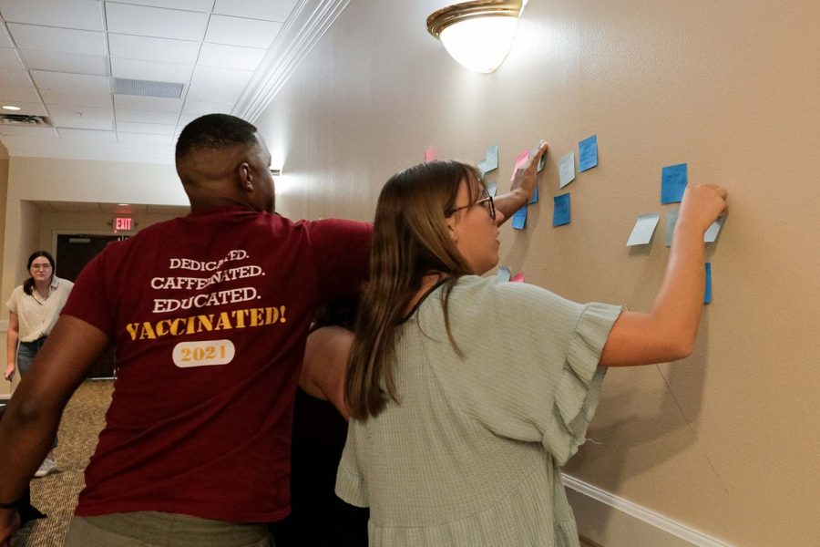 A Post-it Note activity helps SGA understand what students to change on campus, such as food options, parking, academics, and more, Sept. 6.