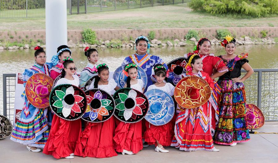 Zavala International Dance stands for a group photo after entertaining visitors to the Finding your Voice closing ceremony, Sept. 17.