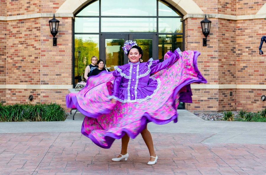 Nursing sophomore Victoria Garcia performs for the crowd at the Viva MSU celebration, Sept. 16. Garcia teaches at Zavala International Dance, where those of any age can learn various styles of dance.