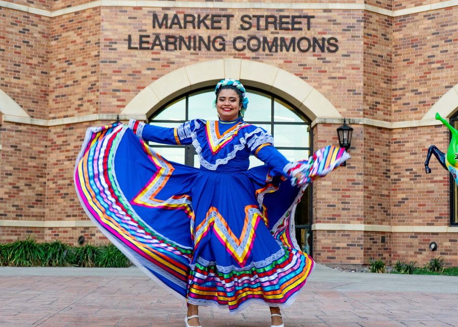 Bilingual education and spanish senior Juanita Orozco dances at the Viva MSU event, Sept. 16. Orozco is an instructor with Zavala International Dance, teaching others various styles of dance.