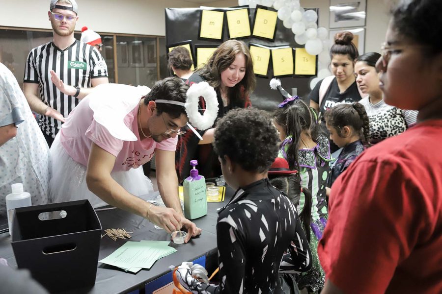 The American Chemical Society helps Trunk or Treaters create slime, Oct. 27.