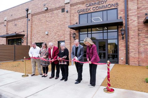 To mark it's opening, donors and MSU staff cut the ribbon to the Cannedy Greek Commons, Oct. 28.