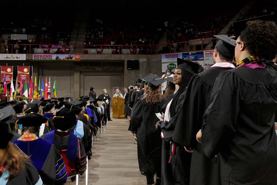 MSU undergraduates wait in line to take their walk across the stage and receive their diplomas, Dec. 10.