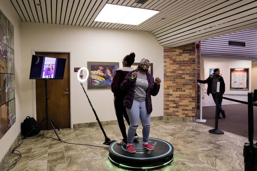 Pre-medical junior Shea Jarvis and nursing senior Taniqua Pennerman try out a revolving camera at the Fall 2022 Finals Frenzy, Dec. 1.