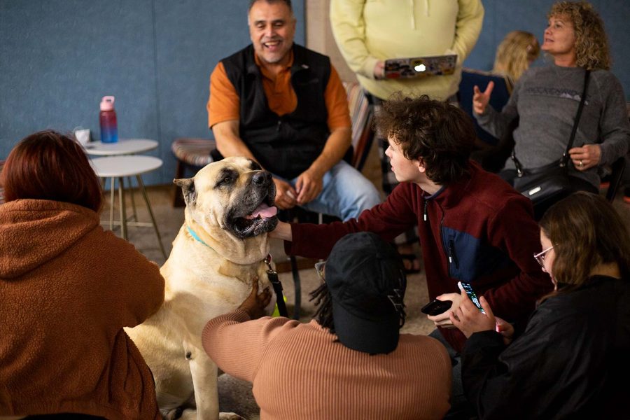 Students pet Koda to help deal with the stress of finals, Nov. 29.