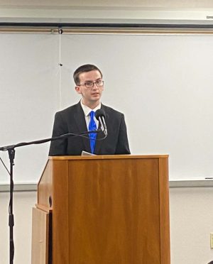 English sophomore Brandon Goins presents his research on queer literature, inspired by his passion on the subject, March 25.