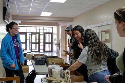 Students peruse the various rocks on sale, April 12.