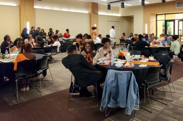 Students dress up and enjoy African food at Afro-chella, Nov. 9.