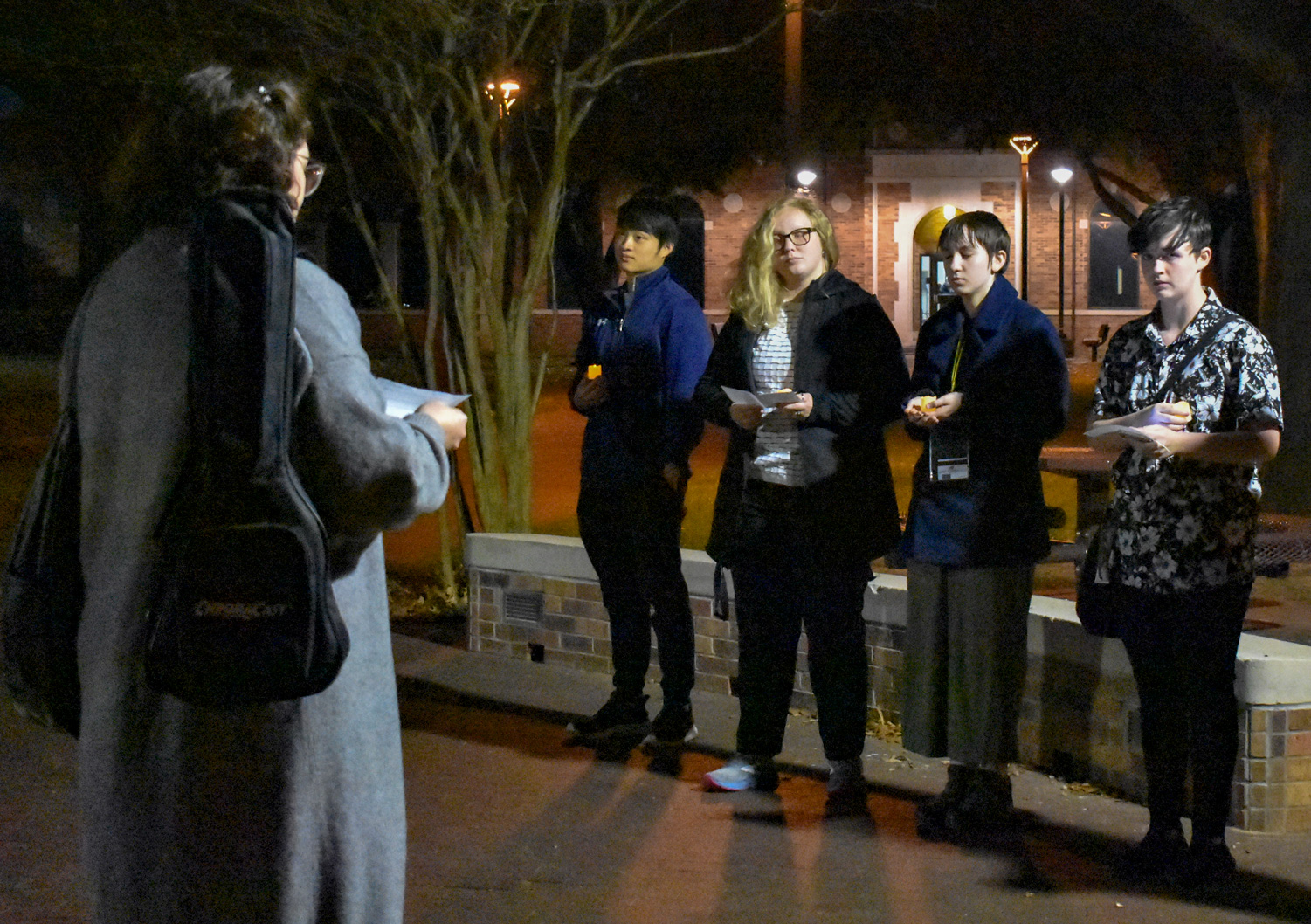 Students gather around the candlelight vigil at Bolin Fountain, Nov. 20.