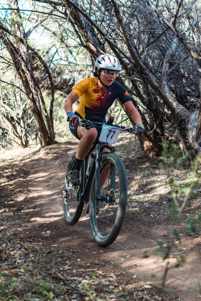 Jacelyn Reno rides through a mountain biking trail, Sep. 24. 2023.